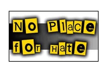 banner saying, "no place for hate"