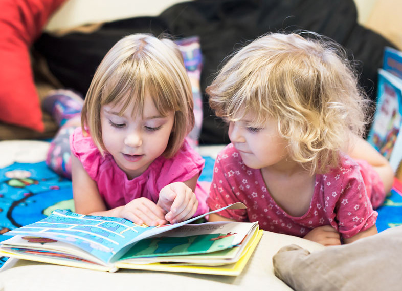 Preschool girls reading