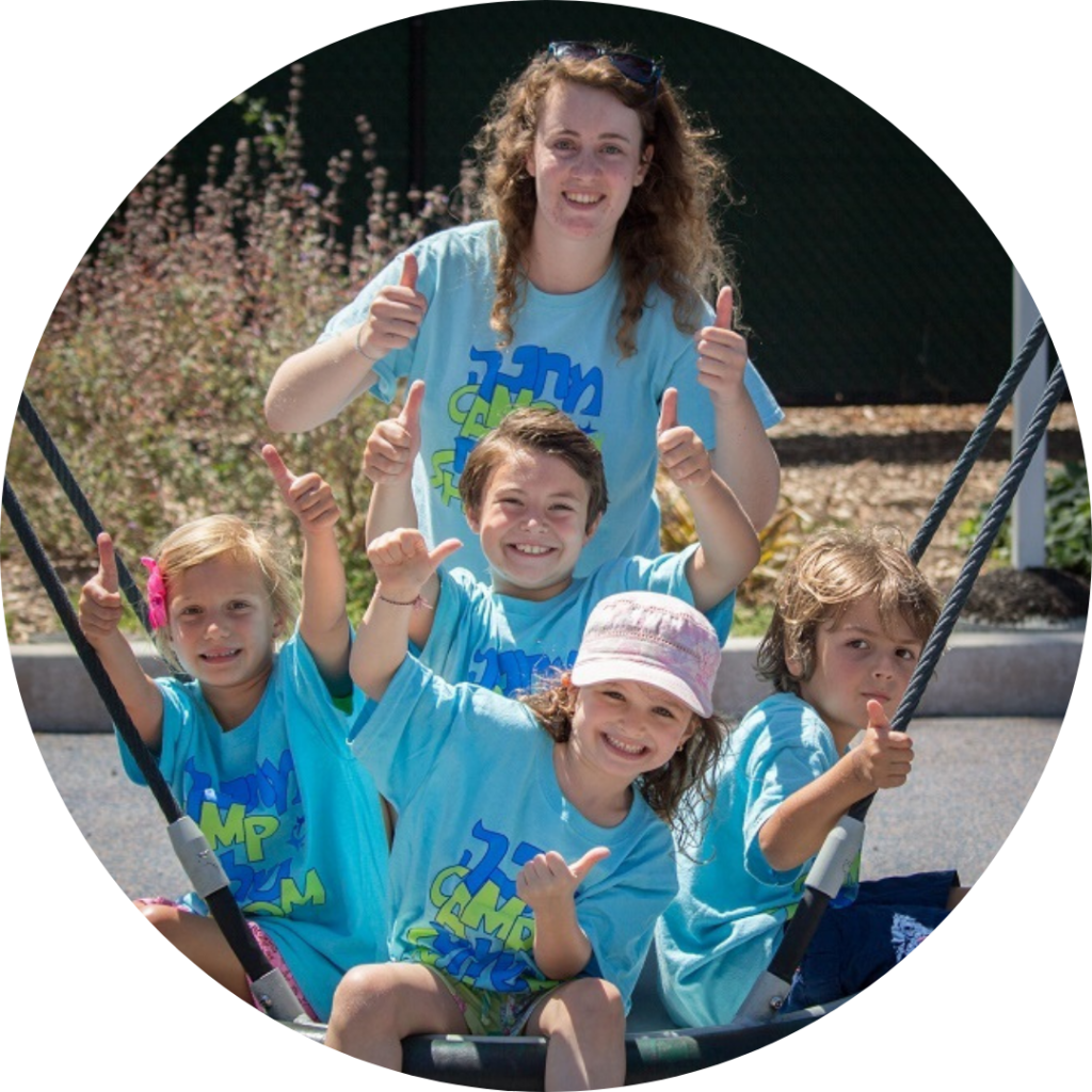 Camp Shalom camp counselor with kids